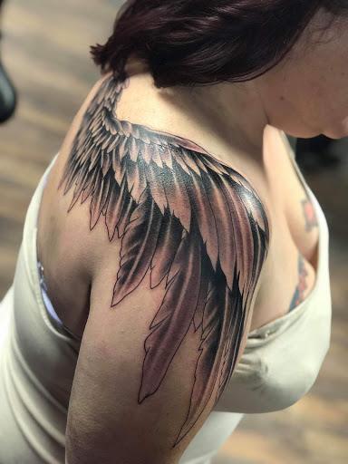 Find top of head tattoo ideas for your next unique tattoo in Huntington at Golden Dagger Tattoos and Piercings