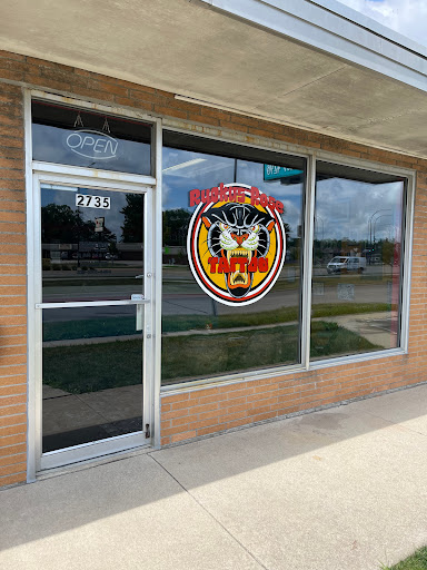 Explore rattlesnake tattoo ideas, creative tattoo ideas in Waterloo, available at Ruckus Rose Tattoo