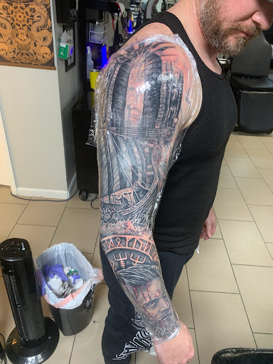 Explore auto mechanic tattoo ideas, creative tattoo ideas in Sarasota, available at SEVEN SINS Tattoo Studio