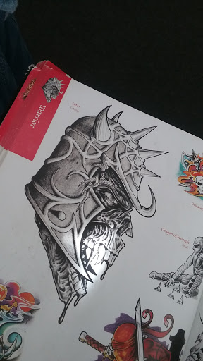 Explore medium tattoo ideas for females, creative tattoo ideas in Waterloo, available at Black Lotus Tattoo Studio