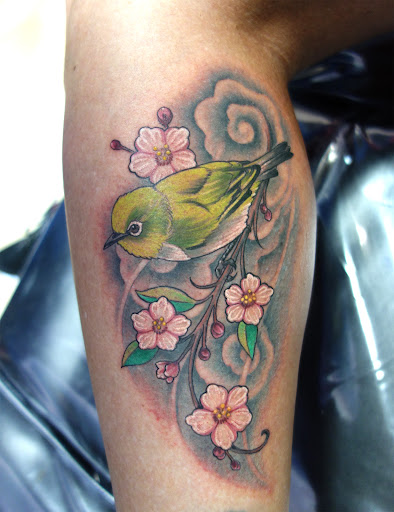 Find breast tattoo ideas for your next unique tattoo in Lawrence at Red 5 Tattoo