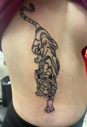 Explore small fishing tattoo ideas, creative tattoo ideas in Slippery Rock, available at Dinky Dachshund Tattoo Parlor