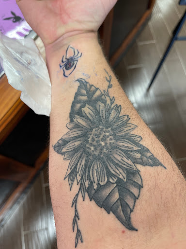 Explore arrow tattoo ideas for guys, creative tattoo ideas in Gautier, available at Voodoo Tattoo
