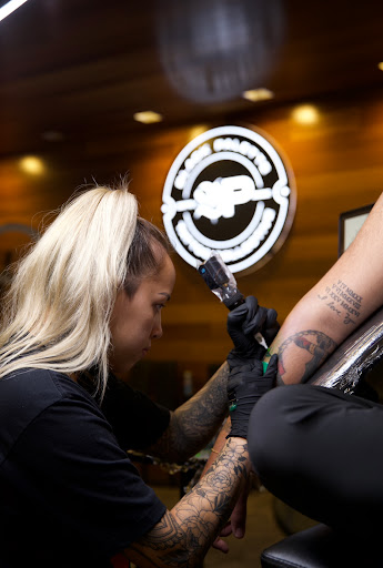 Find gym tattoo ideas for men for your next unique tattoo in Honolulu at Black Palette Tattoo & Piercing