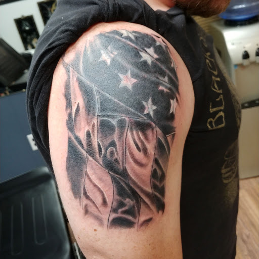 Explore number 2 tattoo ideas, creative tattoo ideas in Mchenry, available at Lunchbox Tattoo and Body Piercing