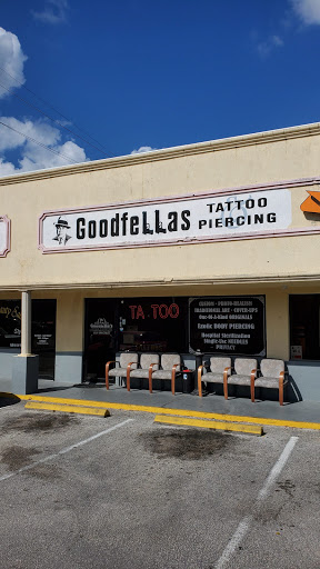 Find tattoo ideas between breast for your next unique tattoo in Fort Pierce at Goodfellas Tattoo & Body Piercing