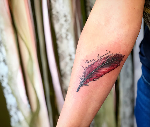 Explore stomach tattoo ideas for men, creative tattoo ideas in Batavia, available at The Pretty Pin-Up Tattoo Parlor