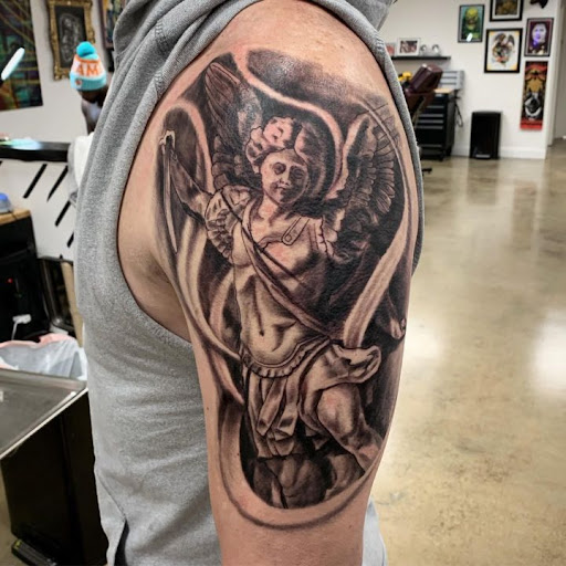 Explore cover up tattoo ideas lower back, creative tattoo ideas in Maryland Heights, available at Thirteen Roses Tattoo & Aesthetics