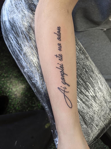 Explore tattoo ideas for behind the ear, creative tattoo ideas in Slippery Rock, available at Dinky Dachshund Tattoo Parlor