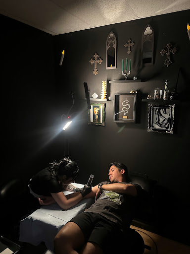 Explore snail tattoo ideas, creative tattoo ideas in Pinellas Park, available at Dark Mark Ink Piercing & Tattoo Studio