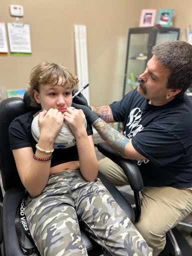 Explore elegant spine tattoo ideas, creative tattoo ideas in Lakeland, available at The Emporium Lakeland