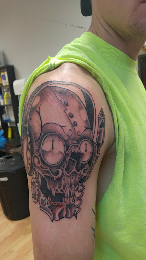 Explore tattoo idea for women, creative tattoo ideas in Le Roy, available at Blood Money Ink