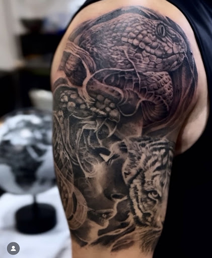 Explore ring tattoo cover up ideas, creative tattoo ideas in Saint Paul, available at Supreme Art Of War Inc