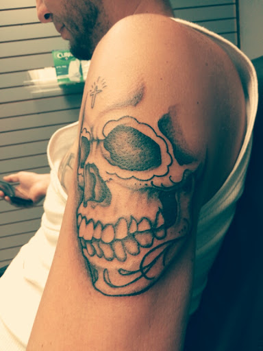 Explore religious cross tattoo ideas, creative tattoo ideas in Warner Robins, available at McDonald Ink