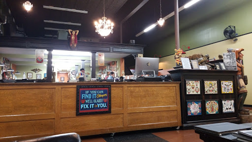 Explore hand tattoo ideas for guys, creative tattoo ideas in Centralia, available at Daddyos Tattoo & Body Piercing