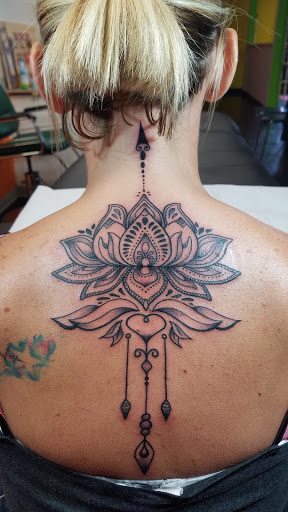 Explore link tattoo ideas, creative tattoo ideas in Peoria, available at Guerrilla Ink Tattoos