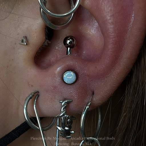 Find crown tattoo ideas for females for your next unique tattoo in Boston at Arcadia Body Piercing