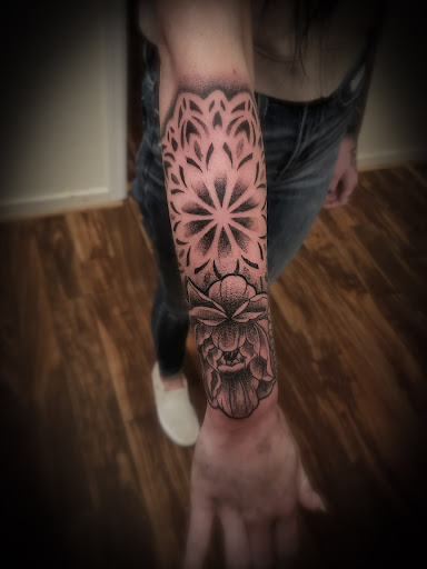 Explore tribal cross tattoo ideas, creative tattoo ideas in Sheridan, available at BlackbearInk Studio LLC