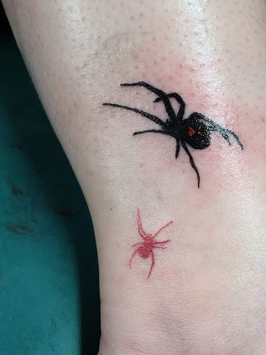 Explore rose and skull tattoo ideas, creative tattoo ideas in San Angelo, available at Alchemy Tattoo and Piercing Studio