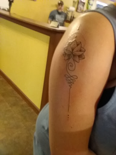 Explore tattoo ideas dolphin, creative tattoo ideas in Kingsport, available at 2 Ton Gallery