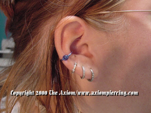 Explore long beach tattoo ideas, creative tattoo ideas in Des Moines, available at Axiom Body Piercing Studio