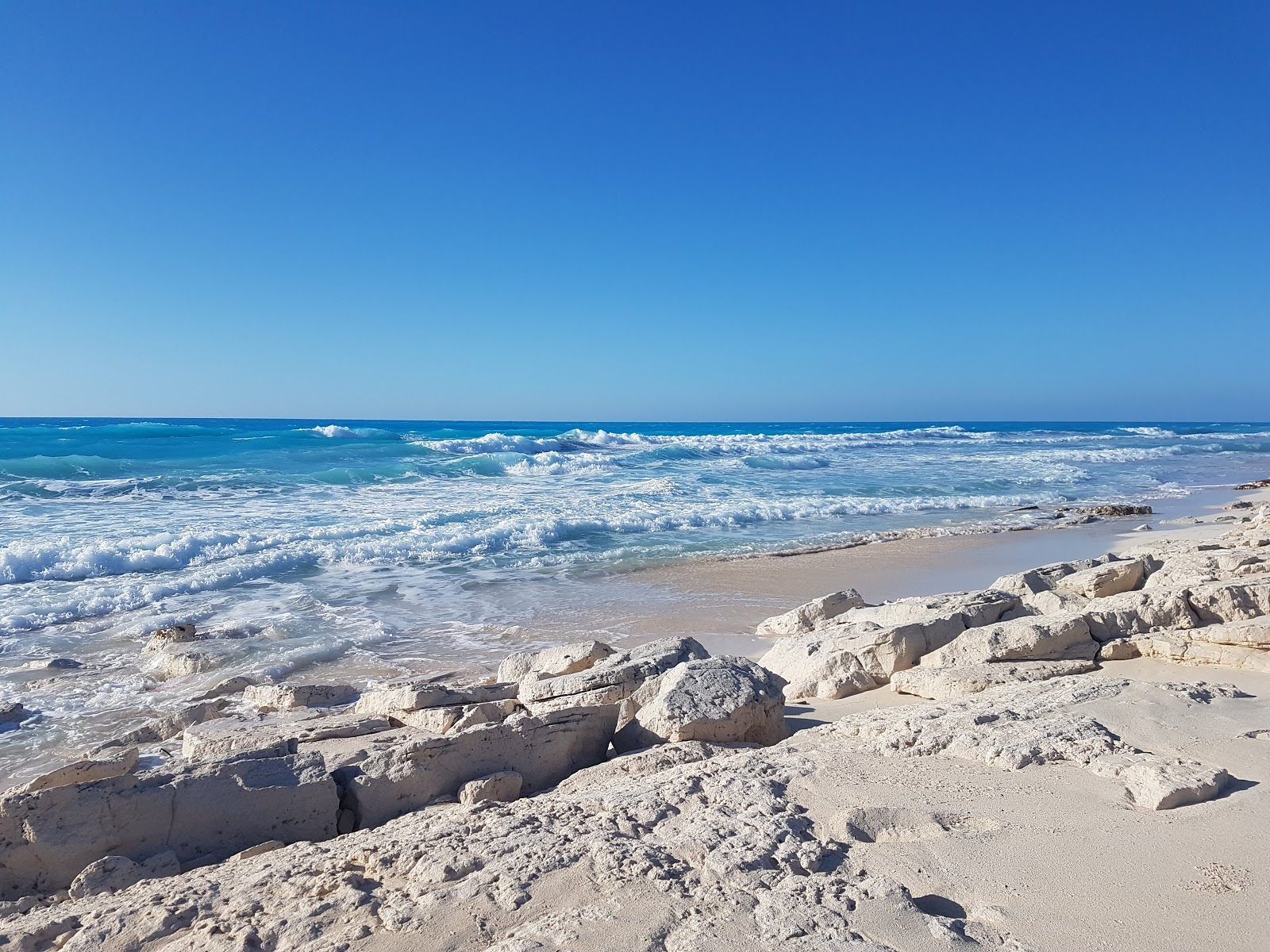 Foto di Paradise Beach con una superficie del sabbia pura bianca
