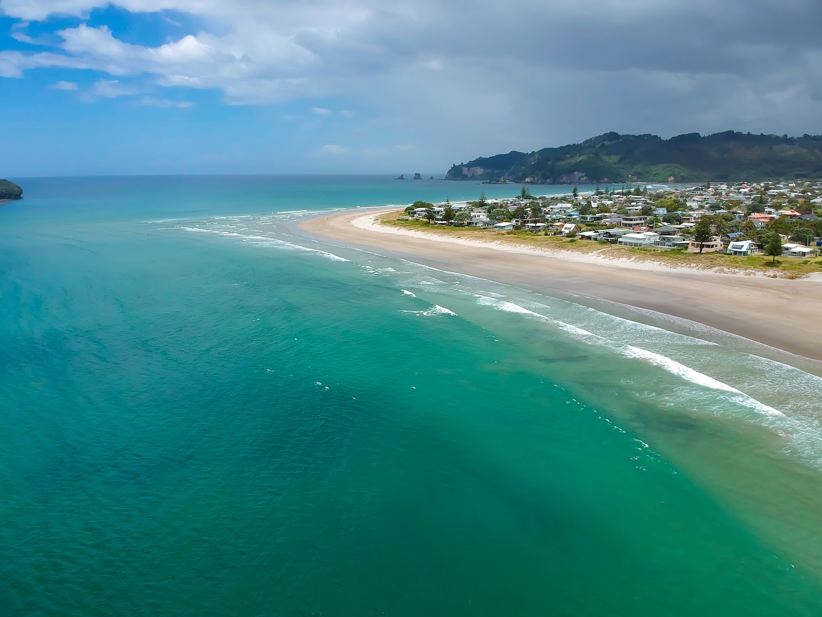 Fotografija Whangamata Beach priljubljeno mesto med poznavalci sprostitve