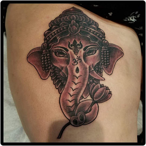 Find tattoo ideas snake for your next unique tattoo in East Boston at Wave n Pave Tattoo