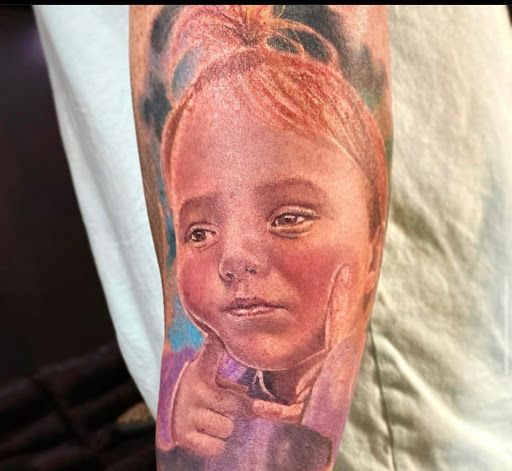 Find clouds tattoo ideas for your next unique tattoo in Fort Wayne at Grade A Tattoos and Body Piercing