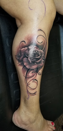 Explore chicano neck tattoo ideas, creative tattoo ideas in Angola, available at Hoodlum Ink