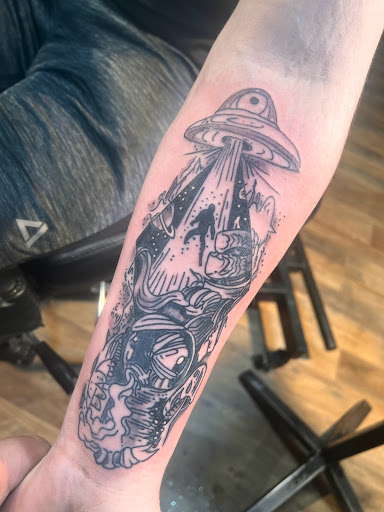 Explore tattoo ideas men arm, creative tattoo ideas in Pikeville, available at The Carbon Canary Tattoo Studio