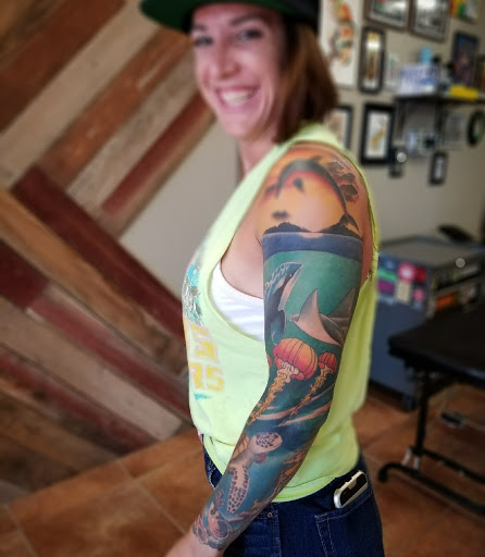 Find tattoo ideas under breast for your next unique tattoo in Boulder City at Ragtown Tattoo