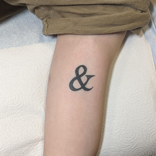 Explore tramp stamp tattoo cover up ideas, creative tattoo ideas in Dallas, available at Franklins Tattoo and Supply