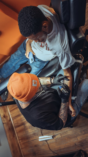 Explore tattoo ideas for aquarius, creative tattoo ideas in Salisbury, available at Touch of Grey Tattoo & Piercing Studio