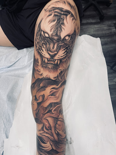 Explore tattoo ideas for female thigh, creative tattoo ideas in Garden Grove, available at Red Blossom Art Studio