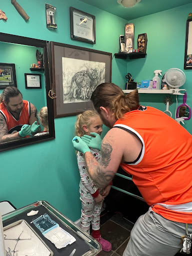 Explore name face tattoo ideas, creative tattoo ideas in Media, available at Baker Street Tattoo