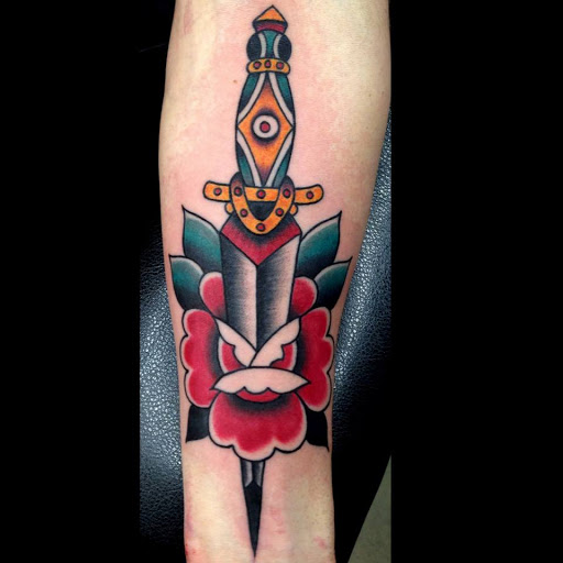 Find tattoo ideas for in between breast for your next unique tattoo in Des Moines at Iron Heart Tattoo