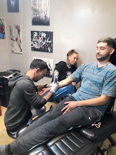 Explore money rose tattoo ideas, creative tattoo ideas in Fort Wayne, available at Grade A Tattoos and Body Piercing