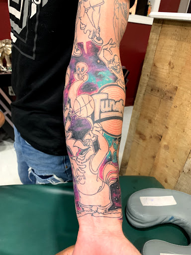 Explore tramp stamp cover up tattoo ideas, creative tattoo ideas in Cape Coral, available at UNRIVALED INK