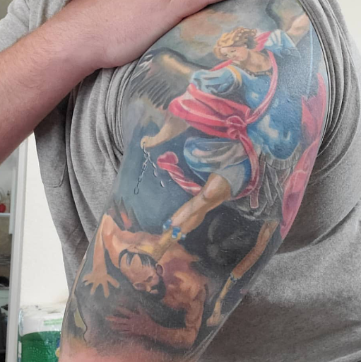 Explore sign language tattoo ideas, creative tattoo ideas in Arlington, available at Pistol Petes Tattoo Saloon