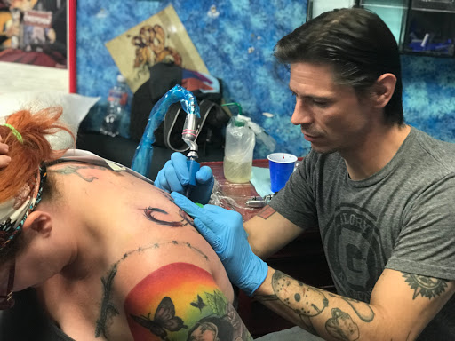 Find armband tattoo ideas for your next unique tattoo in Aurora at Ronin Tattoo Studio INC