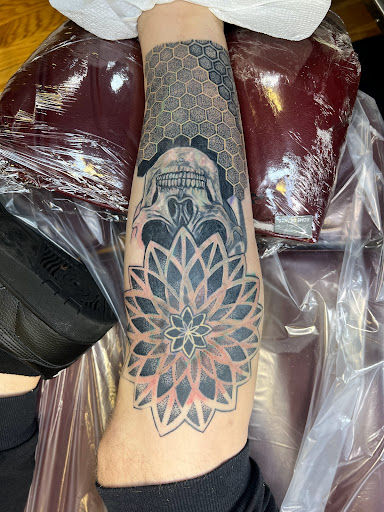 Explore back of knee tattoo ideas, creative tattoo ideas in Woodside, available at Vitruvian Tattoo Culture