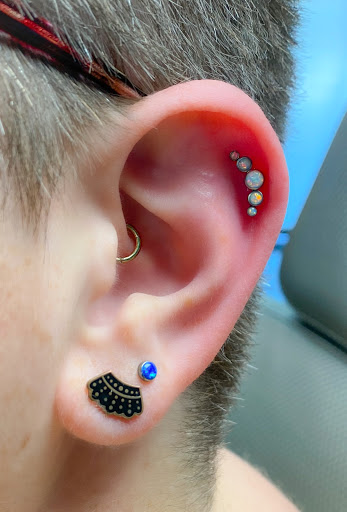 Explore 3/4 tattoo sleeve ideas, creative tattoo ideas in Springfield, available at Body Piercing By Qui Qui