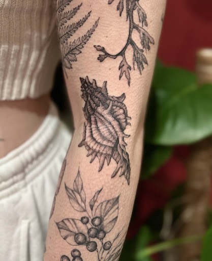 Explore minimalist cat tattoo ideas, creative tattoo ideas in Lander, available at Blackblood Tattoo and Piercing