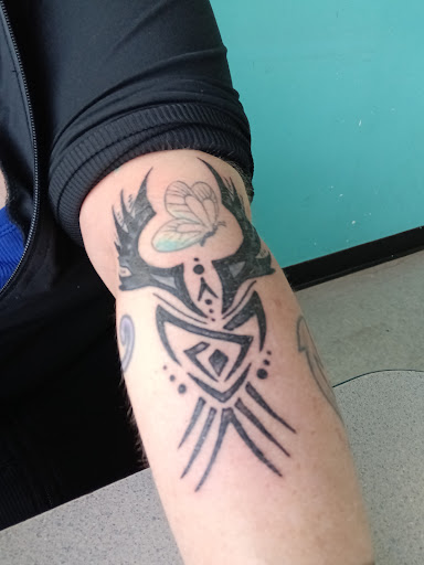 Explore shoulder blade tattoo ideas, creative tattoo ideas in Northfield, available at Trifecta Tattoo Parlor