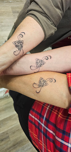 Find underboob tattoo idea for your next unique tattoo in Davenport at Fine Ink Studios Tattoos