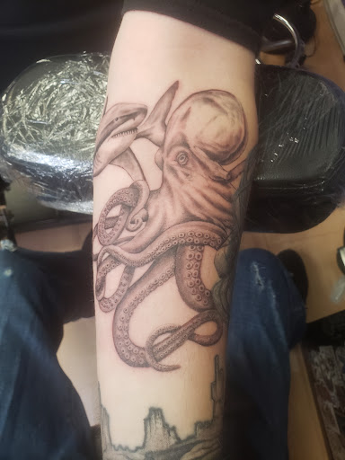 Explore black tattoo ideas, creative tattoo ideas in Cambridge, available at Kappa Tattoo