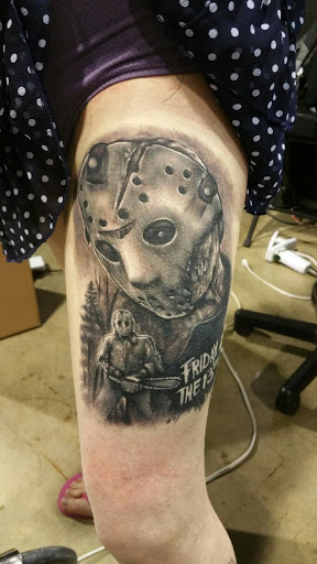 Explore leg tattoo ideas for men, creative tattoo ideas in Youngstown, available at Bitter Hearts Tattoo