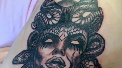 Explore large flower tattoo ideas, creative tattoo ideas in Gadsden, available at Savage City Ink LLC