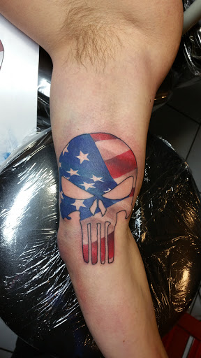 Explore black and white sleeve tattoo ideas, creative tattoo ideas in Foley, available at Black Sheep Custom Tattoos and Piercings